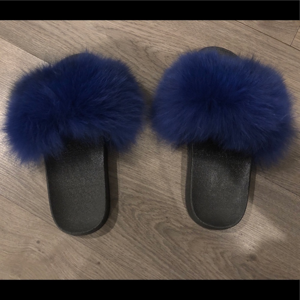Blue faux fur slides